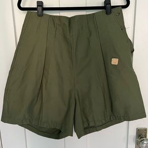 Vintage 1940s military fatigue shorts with original labels.